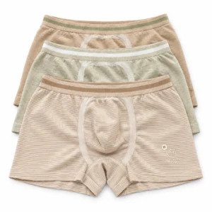 Kids seamless underwear in sage, khaki stripe and nude, laid flat